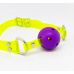 Кляп у рот неоновий БДСМ з фіолетовою кулькою на салатовому ремінці DS Fetish