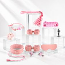 Набір БДСМ на 10 предметів з м'якої екошкіри рожевий DS Fetish в чорній коробочці