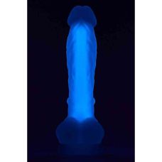 Фалоімітатор реалістичний на присосці фіолетового кольору що світиться в темряві Dream Toys Radiant Soft Silicone Glow In The Dark Dildo Medium Purple