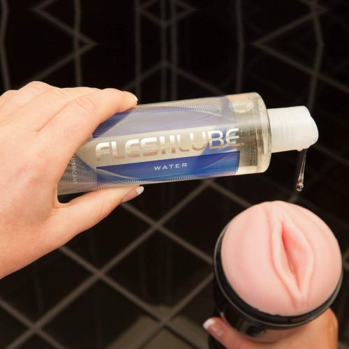 Мастурбатор в колбе вагина из киберкожи телесного цвета Fleshlight Lady Vortex