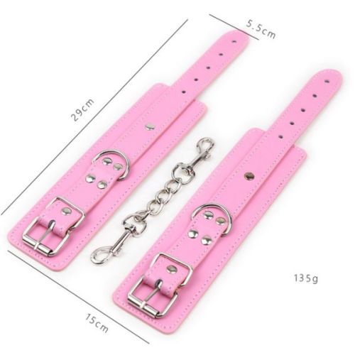 Розово-красные сережки - наручники с заклепками

