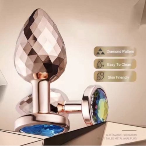 Гранена анальна пробка золото рожеве з каменем синього кольору Bdsm4u Anal Plug розмір Small