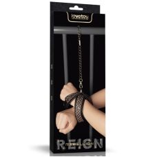 Перехрещені наручники з високоякісного поліуретану чорного кольору Lovetoy Rebellion Reign