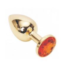 Металева анальна пробка золотиста з червоним кристалом SKN розмір S
