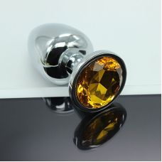 Анальна пробка срібляста з жовтим кристалом SKN-MS86 (розмір S )