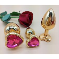 Комплект золотистих анальних пробок у формі серця з рожевим кристалом SKN-NMG04 розмір S, M, L