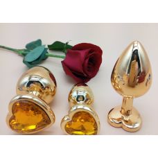 Комплект золотистих анальних пробок у формі серця з жовтим кристалом SKN-NMG06 розмір S, M, L