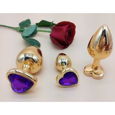 Комплект золотистих анальних пробок у формі серця з фіолетовим кристалом SKN-NMG07 розмір S, M, L